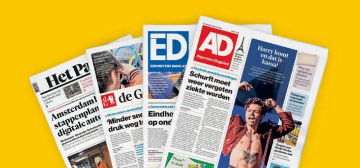 4 kranten tegen een gele achtergrond